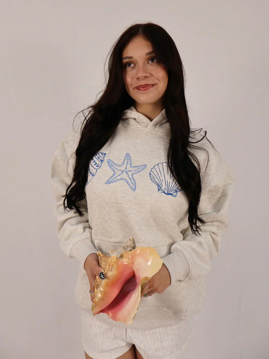 Sweat à capuche coquillage